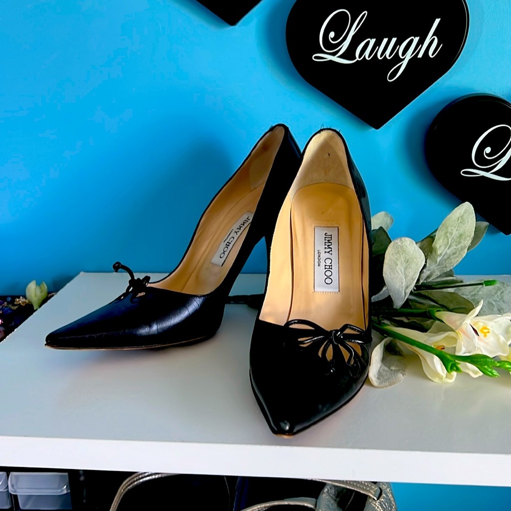 Jimmy Choo 3 1/2 inch stiletto black bow pumps. Size 37 1/2/. 7 1/2.US